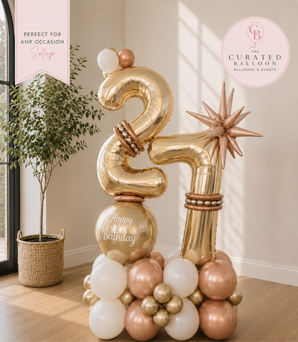 Gold and rose gold number stack with starburst accent